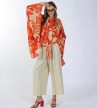 Load image into Gallery viewer, Orange Poncho Sleeve Print Top
